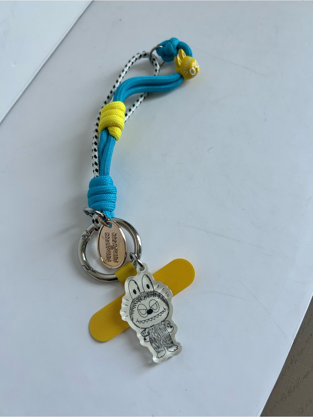 THE MONSTERS 10TH ANNIVERSARY PHONE CHARM